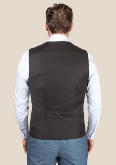 Indulge in timeless sophistication with our Sable Brown Twill Vest. This classic piece exudes elegance and luxury and is custom made from Super 120s pure merino wool to elevate your style. It's the perfect addition to your wardrobe. Elegant Tailored Outerwear For Black Tie Event, Classic Fitted Outerwear For Black Tie Event, Elegant Slim Fit Winter Suits, Elegant Winter Slim Fit Suits, Elegant Black Cashmere Outerwear, Elegant Winter Fitted Suits, Timeless Fitted Winter Suit, Fitted Cashmere Outerwear For Office, Custom Fit Elegant Outerwear For Business