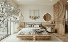 a large bed sitting under a mirror in a bedroom