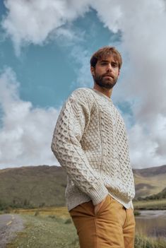 A symbol of Ireland past and present, the Inisheer Traditional Aran Sweater is a timeless addition to your wardrobe. Made with 100% Merino wool, the quality of this authentic Irish gem cannot be rivalled, its is a true Irish hero Aran piece. Much like its namesake, the Inisheer Aran Sweater captures the essence of Ireland in all of its glory. With a beautiful combination of traditional Aran stitches such as honeycomb, moss and cable, this piece is inspired by the past while remaining firmly root Hot Sweater, Aran Sweater, Swim Pants, Christmas Men, Past And Present, Yarn Shop, Wool Sweaters, Honeycomb, Sweater Hoodie