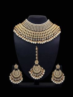 Gold-Plated & White Kundan-Studded & Beaded Bridal Jewelry Set VitansEthnics White Beaded Jewelry Sets For Festivals, White Kundan Jewelry Sets, White Temple Jewelry For Eid, White Beaded Bridal Necklace For Diwali, Festive White Choker Necklace, White Beaded Kundan Necklace For Diwali, White Stone Work Sets For Eid, White Hand Set For Festivals, White Choker For Diwali