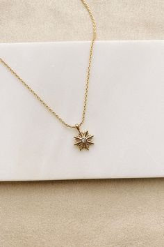 My Inner Light Gold Plated Star Charm Necklace (Gold) - NanaMacs Gold Plated Star Charm Necklaces, Gold Starburst Necklace For Gift, Gold Starburst Necklace With Star Charm, Dainty Gold Starburst Necklace, Star Charm Necklace, Gold Charm Necklace, Inner Light, Luxury Dog, Star Charms