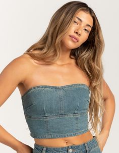 Rsq Denim Tube Top. Crafted From Soft And Durable Denim Fabric, This Tube Top Offers Both Comfort And Style. The Strapless Design Provides A Sleek And Flattering Silhouette, Perfect For Warm Weather Days Or Layering Under Jackets And Cardigans. Zipper Closure At Back. Cropped Fit. 100% Cotton. Machine Wash. Imported. Model Is Wearing A Size Medium. Model Measurements:height: 5'7" Bust: 34.5"waist: 27"hips: 38" Denim Blue Strapless Crop Top For Spring, Strapless Denim Blue Crop Top For Spring, Strapless Light Wash Denim Top, Strapless Denim Crop Top For Spring, Spring Strapless Denim Crop Top, Summer Strapless Denim Blue Vest, Dark Wash Denim Tube Top For Summer, Summer Denim Tube Top In Medium Wash, Summer Medium Wash Denim Tube Top