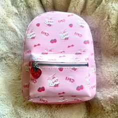 Nwt! Hot Topic Strawberry Milk Mini Backpack. Strawberry And Milk Carton Print. Front Zipper Pocket Has A Cute Strawberry Charm. Adjustable Straps. Interior Drop Pocket. Size: 8 1/2 X 4 X 11 1/4 Everyday Kawaii Backpack With Zipper Closure, Everyday Kawaii Backpack With Zipper, Cute Satchel Backpack With Zipper, Cute Satchel Backpack With Zipper Closure, Cute Everyday Shoulder Backpack, Casual Pouch Backpack For School, Casual School Backpack In Pouch Shape, Casual School Backpack Pouch, Cute Softback Bag With Zipper Closure