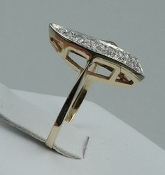 "Stunning 14K yellow gold ultra-classic art nouveau diamond ring with graceful curves and intricate metal designs. This is an eye catcher and a definite powerful option for a right-hand ring. FREE SHIPPING! Details: Solid 14K Yellow Gold (shown in picture) Diamond: (16) 1.2 mm round Approximate Diamond Weight: 0.16 ct. Diamond Clarity: SI1 Diamond Color: G Ring Size: 4 7/8 Total Weight: 2.6 grams FREE Domestic Shipping by USPS Priority Mail Signature Confirmation and includes insurance. If the i Art Nouveau Yellow Gold Rings With Rose Cut Diamonds, Art Deco Diamond Ring Stamped 14k, Art Deco Marquise Yellow Gold Rings, Art Deco 14k Stamped Diamond Ring, Art Deco 14k Diamond Ring, Art Deco Oval Diamond Ring Stamped 14k, Art Deco Diamond Ring With 14k Stamp, Art Deco 14k Gold Diamond Ring, Art Deco Gold Diamond Ring With Marquise Cut