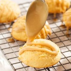 a cookie being drizzled with peanut butter