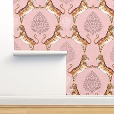 a pink wallpaper with a tiger pattern on it