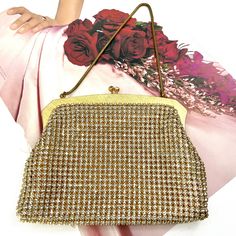 This beautiful vintage OROTON rhinestone / diamanté bag is in fantastic vintage condition.  With very minimal signs of wear, all the rhinestone are in tact and none are missing.  The frame is a gold colour with very minimal surface scratches.  The slightest of colour darkening on one side on the frame at the edge only the size of .5mm. Very minimal.  The inside is clean with no stains, holes or wear. This bag is fantastic.  With very minimal signs of wear it would be perfect for a wedding or for Chic Sparkling Formal Bags, Elegant Sparkling Formal Bags, Elegant Gold Bags For Dinner, Chic Gold Bag For Dinner, Gold Bling Bags For Wedding, Vintage Handheld Evening Bag For Party, Elegant Formal Bags With Bling, Elegant Formal Bag With Bling, Classic Gold Handheld Bag