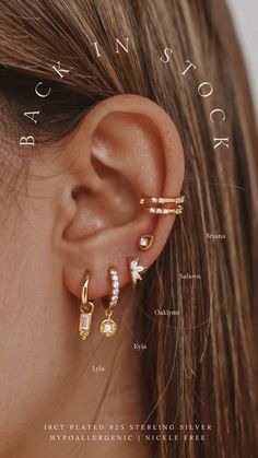 a woman's ear with three different types of piercings on the front and back