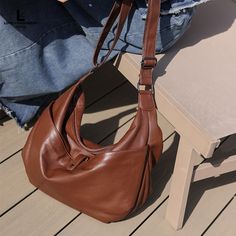 Discover Timeless Elegance and Versatility Step into a world of sophistication with our High-Quality Genuine Leather Women's Crossbody Hobo Bag. Crafted from premium cowhide leather, this purse embodies durability and style, featuring an exquisite stone pattern that exudes a vintage charm. Its generous dimensions (48x10x32 cm) ensure ample space for all your essentials, making it the perfect companion for everyday elegance. Designed for Everyday Elegance From its soft cotton lining to its practi Leather Hobo Shoulder Bag For Business, Leather Hobo Bag With Adjustable Strap For Business, Business Leather Hobo Bag With Adjustable Strap, Fall Leather Lining Hobo Shoulder Bag, Luxury Soft Leather Hobo Bag For Fall, Business Soft Leather Crossbody Hobo Bag, Versatile Leather Hobo Bag With Leather Lining, Luxury Leather Hobo Bag For Fall, Fall Soft Leather Hobo Bag