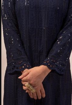 No-Fuss Solid Navy Blue Straight Chikankari Kurta and Pant set with Sequin WorkGet ready to play host this festive season with this solid Navy Blue kurta and pant set. A simple silhouette and intricate Chikankari embroidery with matching sequins contribute to a rich classy look without overdoing it. Accessorise with modern or traditional jewellery as the occasion calls for. Product Details Material: Chikankari Type of Work: Chikankari + Sequin Work Material: Chikankari Fit: Comfortable Contents: Festive Blue Palazzo Set With Chikankari Embroidery, Elegant Blue Self-design Palazzo Set, Festive Palazzo Set With Cutwork And Straight Kurta, Festive Palazzo Set With Straight Kurta And Cutwork, Long Sleeve Traditional Wear With Cutwork For Eid, Long Sleeve Cutwork Traditional Wear For Eid, Eid Traditional Wear With Cutwork And Long Sleeves, Unstitched Long Sleeve Cutwork Kurta, Cutwork Kurta For Eid