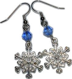 Elegant Winter Jewelry As Gift, Elegant Snowflake Jewelry For Festive Occasion, Elegant Christmas Jewelry With Dangle Shape, Elegant Silver Holiday Jewelry, Sparkling Silver Christmas Jewelry, Elegant Festive Jewelry For Winter, Festive Holiday Dangle Jewelry, Festive Holiday Jewelry With Dangle Shape, Adjustable Sterling Silver Christmas Jewelry