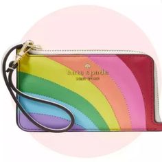 Kate Spade Pride Rainbow Collection Small Card Holder Wristlet Wallet Nwt Authentic Kate Spade New York Nwt Brand New With Tag Rainbow Front Saffiano Ksny Metal Pinmount Logo Exterior Back Id Window And 2 Credit Card Slots L-Zip Closure Interior Key Ring Signature Two Way Script Logo Jacquard Lining Wristlet Strap (One End Detachable Clip On) Size: 4.6” W X 3.2” H Color: Multi Msrp $139 Plus Tax Kg675 Trendy Kate Spade Rectangular Wallet, Kate Spade Rectangular Wallet Perfect For Gift, Kate Spade Rectangular Wallets Perfect For Gifts, Kate Spade Rectangular Wallets Perfect For Gift, Kate Spade Rectangular Wallets As Gifts, Multicolor Wristlet With Card Slots For Daily Use, Everyday Multicolor Wristlet With Card Slots, Multicolor Zipper Pouch Wristlet Clutch, Multicolor Wristlet Clutch With Zipper