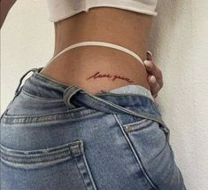 a woman's stomach with the word love written on it