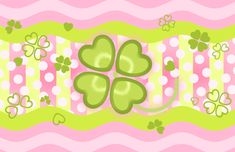 four leaf clovers on a pink and green striped background with white polka dotes