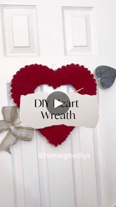 a heart shaped wreath with the words diy heart wreath hanging on it's front door