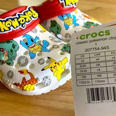 Crocs Toddler Classic Pokemon Clog - 207754-94s White/Multi Nwt Size C4 Synthetic Slip-on Clogs For Playtime, Cute White Slip-on Clogs, Playful White Clogs, White Non-slip Clogs For Playtime, Non-slip White Clogs For Playtime, Fun White Slip-on Clogs, Playful White Non-slip Clogs, White Non-slip Fun Clogs, Playtime Slip-on Synthetic Clogs