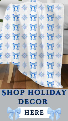 Holiday blanket with blue bows and snowflake patterns draped over a bed, adding a cozy and festive touch to winter decor. Luxury Blankets, Winter Throw Blanket, Soft Cottagecore, Cozy Holiday Decor, Holiday Movie Night, Cottagecore Christmas, Snowflake Patterns, Holiday Blankets, Pattern Blanket