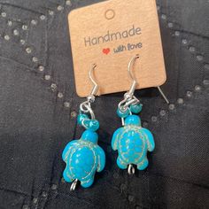 Handmade Turtle Earrings. Cute With Everything! Includes Silicone Backs To Ensure They Are Not Lost! Nickel-free Blue Beaded Earrings As Gift, Nickel-free Blue Beaded Earrings For Gifts, Adjustable Light Blue Earrings, Blue Hypoallergenic Beaded Earrings As Gift, Handmade Blue Earrings As A Gift, Handmade Blue Earrings For Gift, Hypoallergenic Blue Beaded Earrings For Gift, Casual Blue Earrings For Pierced Ears, Casual Adjustable Nickel-free Earrings