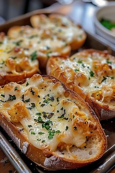 baked bread with cheese and herbs on top