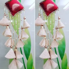 two pictures of red and white decorations hanging from green leaves with beads on the strings