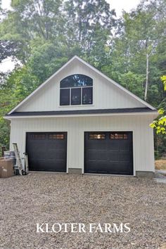 a two car garage with the words koter farms on it's front door