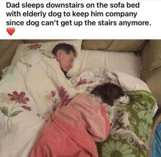 a man sleeping in bed with his dog on top of him and the caption reads dad sleeps downstards on the sofa bed with elderly to keep him company since they can't get up