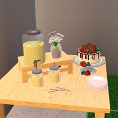 a wooden table topped with a cake next to two vases filled with strawberries