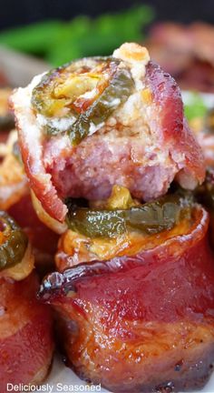 A close up photo of sausage wrapped in bacon and covered in barbecue sauce. Sausage Wrapped In Bacon, Smoked Pig Shots, Bacon Wrapped Kielbasa, Eat Appetizers, Pig Shots, Pig Shot, Fried Steak Recipes, Honey Barbecue, Wrapped In Bacon