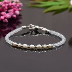 Delicate Moonstone & Freshwater Pearl Beaded Bracelet. Beaded Bracelet This bracelet is very dainty - beads measure about 3-4mm apiece AAA Quality Please Feel Free To Contact If You Have Any Query. Orders are shipped within 1 business working day, excluding orders made on Sunday or national holidays. Domestic delivery takes 5-7 business days. International delivery takes 11-23 business days. PAYMENT METHOD : PayPal only Please send all payments within 7 days . Return policy: We are very confiden Pearl Beaded Bracelets With Natural Stones, Dainty Pearl Bracelet With Faceted Round Beads, Natural Stone Pearl Beaded Bracelets, Spiritual Silver Pearl Bracelet With Gemstone Beads, Adjustable Elegant Moonstone Beaded Bracelets, Beaded Moonstone Crystal Bracelet With Round Beads, Beaded Moonstone Crystal Bracelet, Adjustable Moonstone Beaded Bracelet, Hand-strung Moonstone Beaded Bracelets