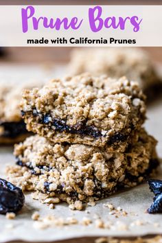 three blueberry crumble bars stacked on top of each other with the words, made with california prunes