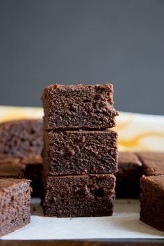 chocolate brownies stacked on top of each other