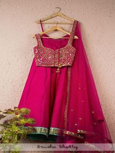 Magenta Pink Mirror Lehenga Set (Set of 3) By Anisha Shetty now available at Trendroots Luxury Art Silk Choli With Mirror Work, Luxury Silk Choli With Mirror Work, Cheap Party Lehenga With Zari Work, Affordable Traditional Blouse With Mirror Work, Luxury Pink Traditional Wear With Mirror Work, Cheap Traditional Blouse With Mirror Work, Luxury Raw Silk Blouse Piece With Mirror Work, Luxury Pink Blouse With Mirror Work, Luxury Dola Silk Blouse Piece With Mirror Work