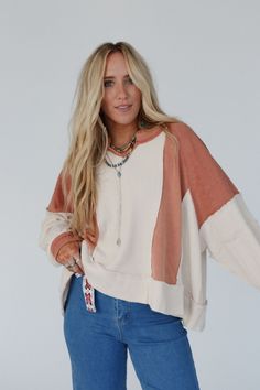 Elevate your casual boho style with our Ashley Color Block Top - both comfortable and oh so cute, you’re going to fall in love! Comfy, Cotton terry knit and thermal fabric that moves with you all day long Relaxed and loose silhouette with a notched neckline Dropped shoulders with long length sleeves for a laid-back and relaxed vibe Exposed seams and frayed edges throughout for a boho vibe Pair with: Sophie Crochet Lace Bralette, Washed Ashore Ruffled Maxi Skirt and Turquoise Cascade Necklace. *D Fall Bohemian Tops For Loungewear, Free-spirited Cotton Tops For Fall, Fall Cotton Free-spirited Tops, Oversized Bohemian Loungewear Sweater, Bohemian Long Sleeve Relaxed Fit Sweater, Oversized Bohemian Sweater For Loungewear, Bohemian Oversized Loungewear Sweater, Bohemian Beige Loungewear Tops, Bohemian Soft Knit Long Sleeve Tops