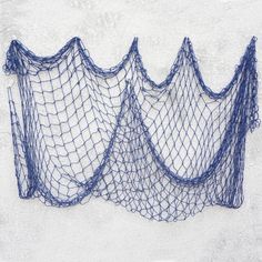 three blue netting hanging on the side of a building with white walls and cement flooring