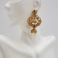 This beautiful earrings set has an excellent finish and gives out an exquisite sense of style. If you are looking for an amazing Fashion Jewelry set for special occasions such as Anniversary, Engagement, Party, Wedding, or for gifting, then your search ends here. Handmade Indian Temple Jewelry, best to wear it for traditional ceremonies or Indian wedding. This bridal jewelry has an ethnic finish. It has Cubic Zircon stones with semi-precious ruby and emeralds. It is a Bollywood style one gram je Exquisite Pearl Earrings For Evening With Elegant Design, Elegant Gold Jewelry Sets With Drop Earrings, Elegant Metal Chandbali Bridal Earrings, Elegant Metal Jhumkas With Intricate Design, Elegant Chandbali Bridal Earrings In Metal, Elegant Metal Chandbalis With Intricate Design, Elegant Gold Plated Chandbali Jewelry Sets, Elegant Gold-plated Chandbali Jewelry Sets, Gold Pearl Drop Earrings For Temple Jewelry