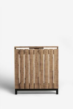 the sideboard is made out of wood and has metal bars on each paneling