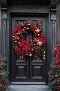 Black front door adorned with a festive red and gold Christmas wreath. Big Wreaths For Outside Christmas, Christmqs Wreaths, Large Christmas Wreaths Diy, Large Christmas Wreath Over Garage, Massive Christmas Wreath, Unique Door Wreaths Diy, Outside Wreaths, Christmas Front Door Decorations Diy, Christmas Wreath On Door