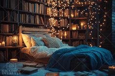 a bedroom with bookshelves full of books and candles on the floor, all lit up