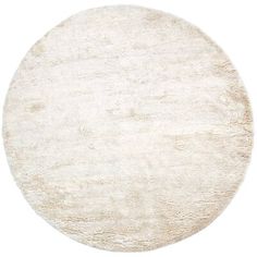 a round white rug on a white background