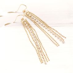 Gold Tassel earrings, Cubic Tassel earrings, Long Chain Tassel earrings, Chain gold earrings Elegant Tassel Earrings For Festive Occasions, Glamorous Gold Tassel Earrings For Wedding, Gold Linear Earrings With Dangling Beads For Party, Gold Earrings With Dangling Charms For Party, Glamorous Gold Linear Earrings As Gift, Glamorous Gold Linear Earrings For Gift, Gold Dangle Tassel Earrings For Wedding, Gold Tassel Earrings For Party, Gold Chandelier Earrings With Ear Wire For Party