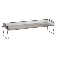 a metal shelf with mesh on the top and bottom, in front of a white background