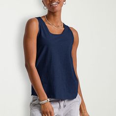 Basics that are far from basic. This cute and comfortable women's tank will get you from here to there in style with ease. Made with recycled polyester, so it's lightweight and has that soft-to-the-touch feel you know and love. A roomy fit that can be dressed up or down. Quality-wise, this tank does the most! Banded collar, armholes, and double-needle stitching on the hem for a fit that won't quit. Grab a few in our basic colors and beef up your staples with these tank tops for women by Hanes or Blue Relaxed Fit Tank Top, Versatile Cotton Tank Top For Loungewear, Casual Scoop Neck Tank Top With Relaxed Fit, Blue Relaxed Fit Tank Top For Everyday, Versatile Cotton Tank Top With Scoop Neck, Versatile Cotton Scoop Neck Tank Top, Everyday Blue Sleeveless Tank Top, Casual Blue Sleeveless Tank Top, Versatile Relaxed Fit Tank Top