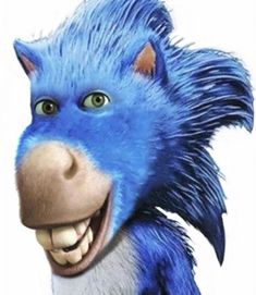 the blue furry animal is smiling with its mouth open and tongue out, as if it's holding something in one hand