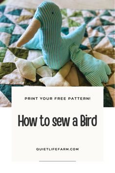 a stuffed bird sitting on top of a bed with the text print your free pattern how to sew a bird