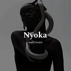 a black and white photo with the words nyoka snake in it's mouth