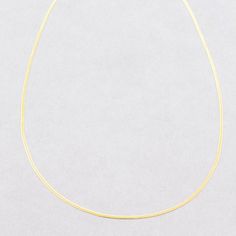 Our 10Kt gold herringbone chain styles are handcrafted into a delicate, flat-laying shape with fluid movement. This demi version of our signature Herringbone Necklace has the same glamorous, liquid gold look in a slender size.  10kt Yellow Gold Herringbone Necklace 16" Length  Do not bend or pull this chain, as the Herringbone is delicate by nature and cannot be repaired. Not suitable for pendants. All sales are final, no exceptions. Minimalist 14k Gold Snake Chain Necklace, Classic Gold Herringbone Necklace With Delicate Chain, Classic Yellow Gold Herringbone Necklace With Delicate Chain, Minimalist Gold-plated Herringbone Necklace, Classic Yellow Gold Snake Chain Necklace For Everyday, Classic Yellow Gold Snake Chain Necklace, Minimalist Gold Plated Herringbone Necklace, Classic 14k Gold Herringbone Necklace With Box Chain, Minimalist 14k Gold Herringbone Necklace With Box Chain