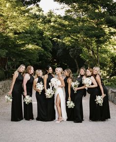 a group of women standing next to each other