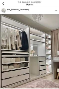 an organized closet with white drawers and shelves