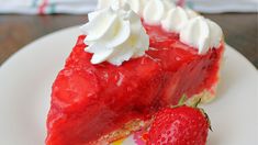 a slice of strawberry pie with whipped cream on top