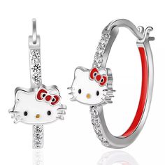 two hello kitty hoop earrings with red and white crystals on each side, one in the shape of a cat's head